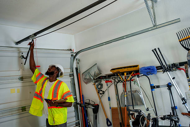 Professional Garage Door Roller Replacement technician working in Lindenhurst, NY